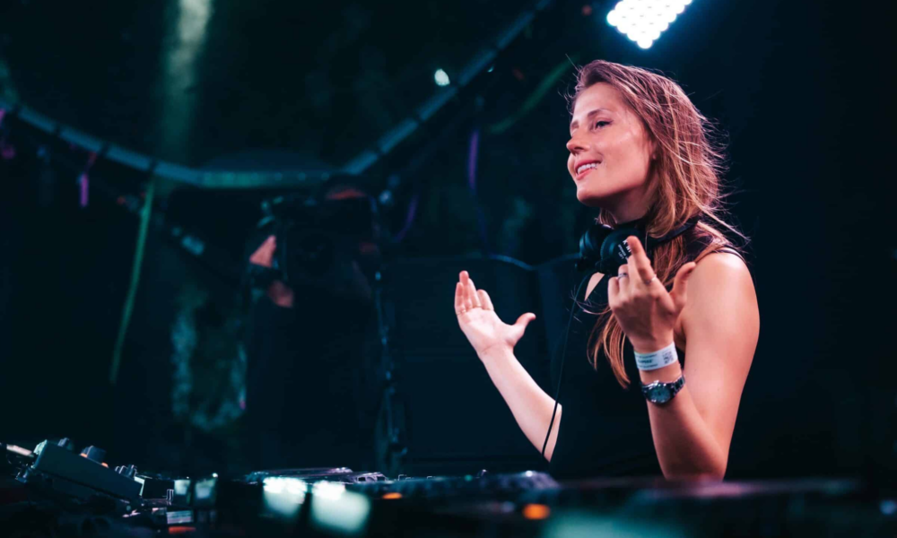 Charlotte de Witte performing behind the decks, featured in New EDM Friday Sep 25