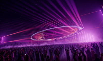 Head Trip stage design featuring a large circular overhead structure, purple lighting and a crowd in front of the stage