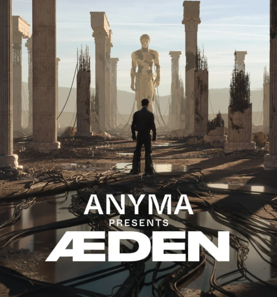Anyma presents ÆDEN artwork showing a futuristic ruined landscape with towering columns, a central statue and the ÆDEN logo in the foreground