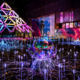 Illuminated installations at Aura Bay Light Park in Budapest, with a multicoloured pyramid and glowing botanical displays on Óbudai Island.