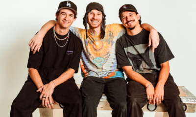 Portrait of Levity members smiling together against a light background.