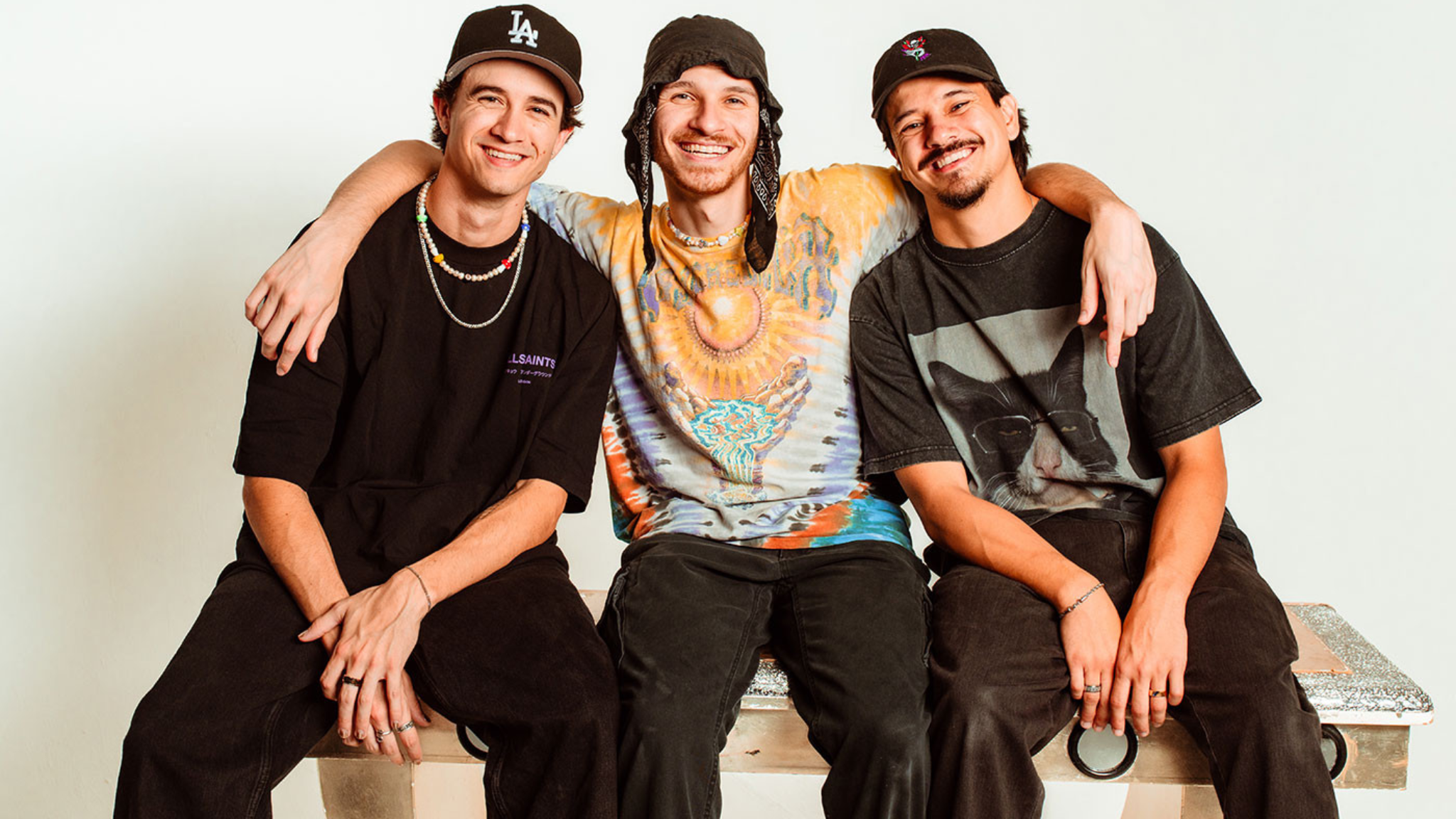Portrait of Levity members smiling together against a light background.