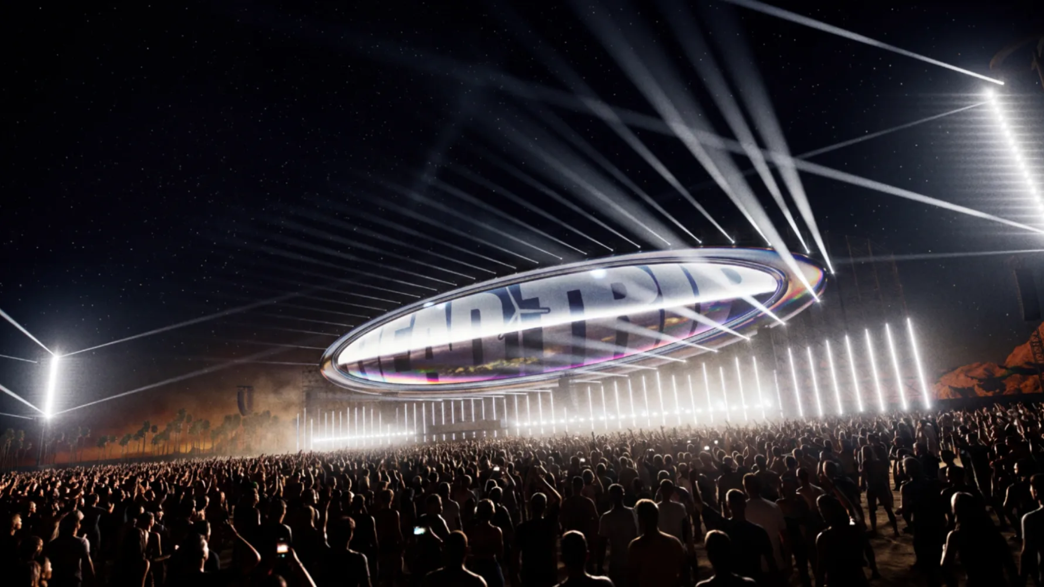 Head Trip stage concept at Empire Polo Club with a large suspended oval structure, bright white beams and a crowd below