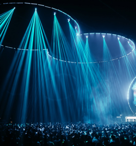 Charlotte de Witte playing at 808 Festival beneath blue stage lighting in front of a large crowd