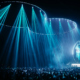 Charlotte de Witte playing at 808 Festival beneath blue stage lighting in front of a large crowd