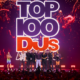 Top 100 DJs Awards ceremony on stage at [UNVRS] in Ibiza with several artists holding awards in front of the crowd
