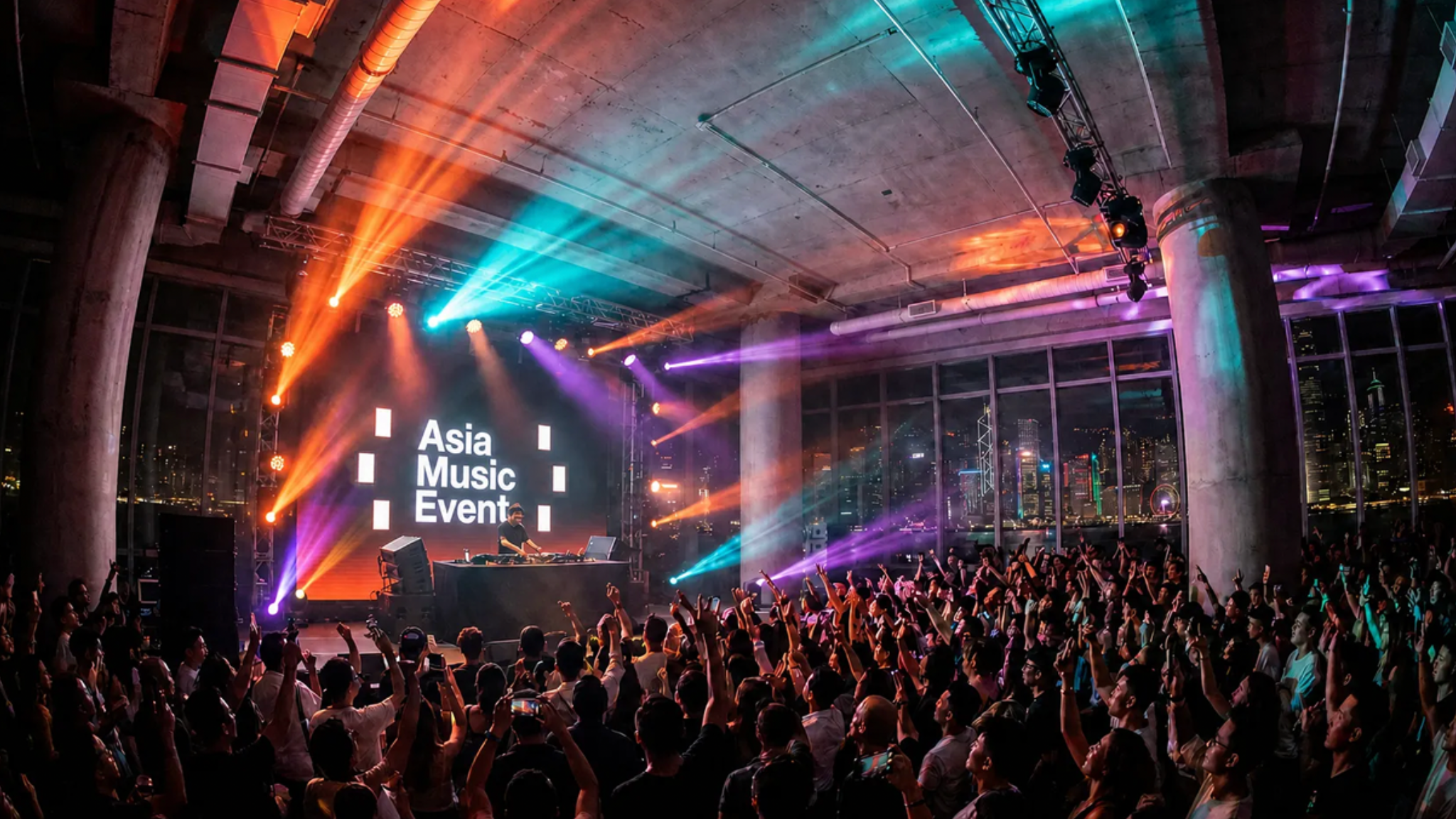 A DJ performs at Asia Music Event in Hong Kong as a large crowd gathers in front of the stage with the Asia Music Event logo on screen.