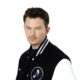 Fedde Le Grand wearing a black and white jacket in a promotional portrait for his new house single, ‘What I Want’.