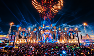 EDC Las Vegas stage lit up at night with fireworks above a large crowd