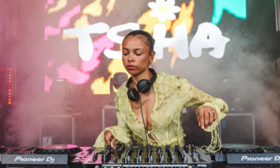 TSHA performing behind Pioneer DJ equipment at a Change the Beat event