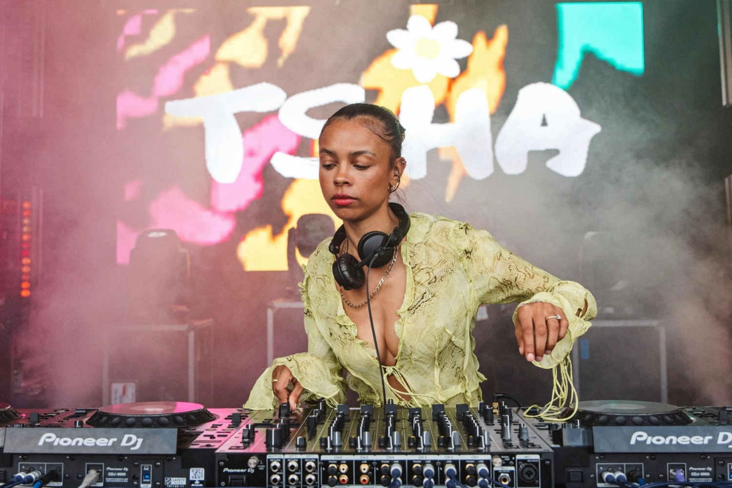 TSHA performing behind Pioneer DJ equipment at a Change the Beat event