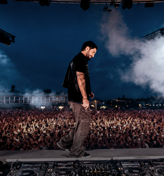 Alesso performing on stage in front of a large crowd, featured in New EDM Friday Oct 16