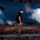 Alesso performing on stage in front of a large crowd, featured in New EDM Friday Oct 16