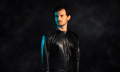 Aurory wearing a black jacket against a dark background for his new single Telekinesis on Deer Deer Music