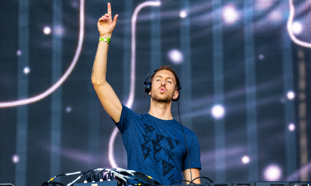Calvin Harris performing on stage during a live show