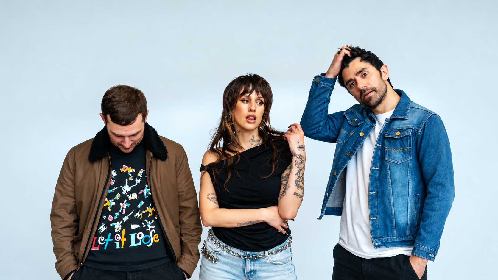 Dev and The Cataracs posing together in a promotional photo
