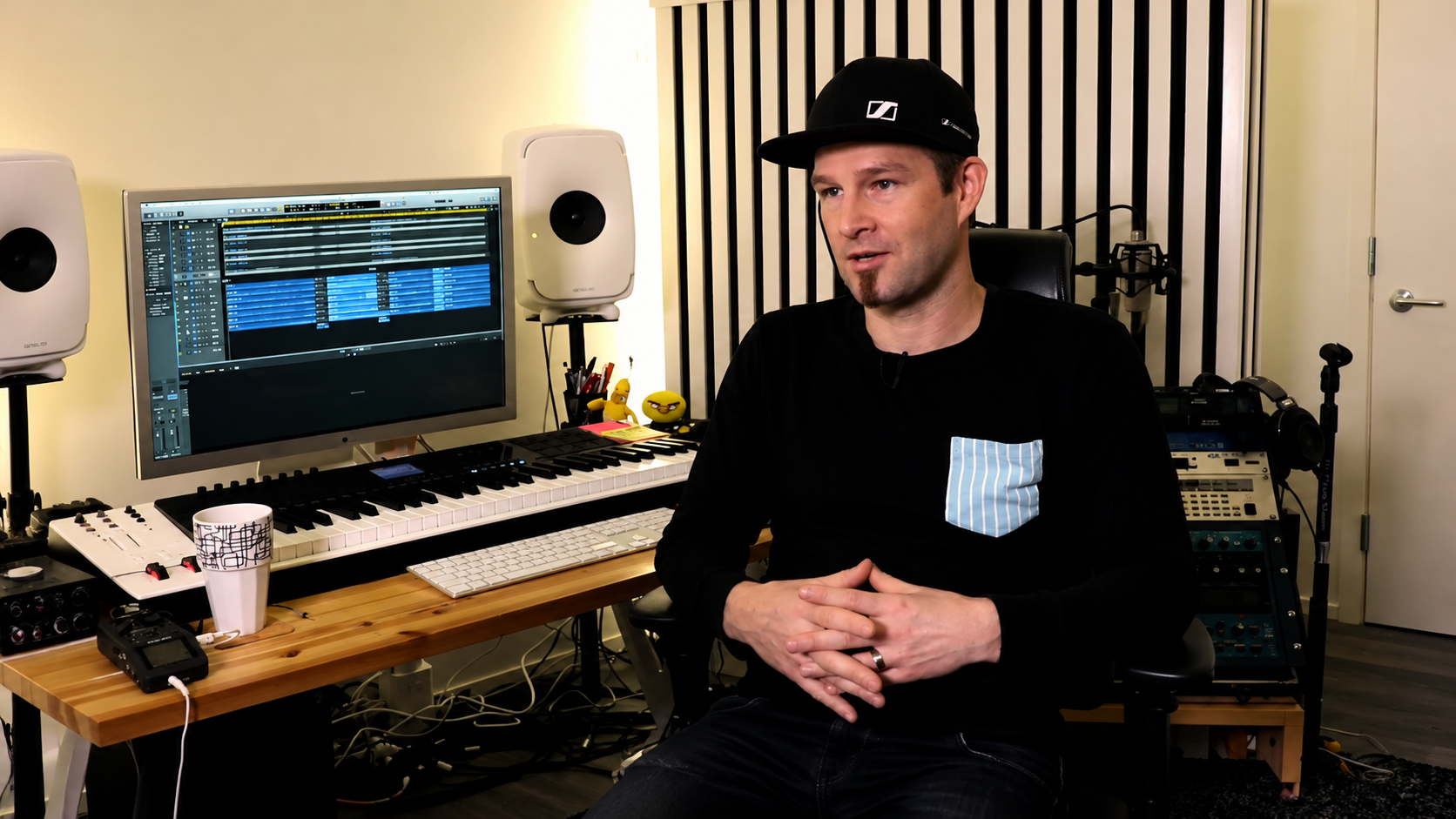 Darude sitting inside his music studio for the 27th anniversary of Sandstorm