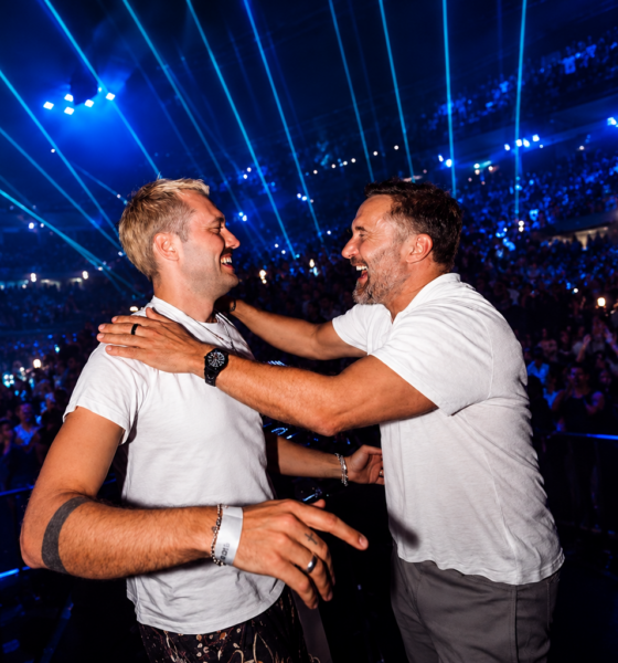 Marlon Hoffstadt and David Guetta on stage in front of a large crowd, featured in New EDM Friday Oct 9