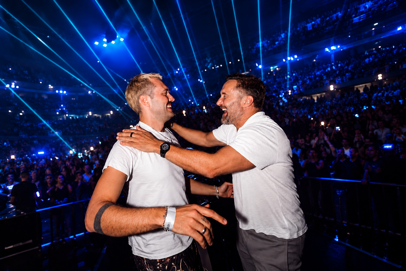 Marlon Hoffstadt and David Guetta on stage in front of a large crowd, featured in New EDM Friday Oct 9