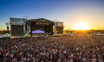 Huge crowd facing the Lollapalooza main stage at sunset
