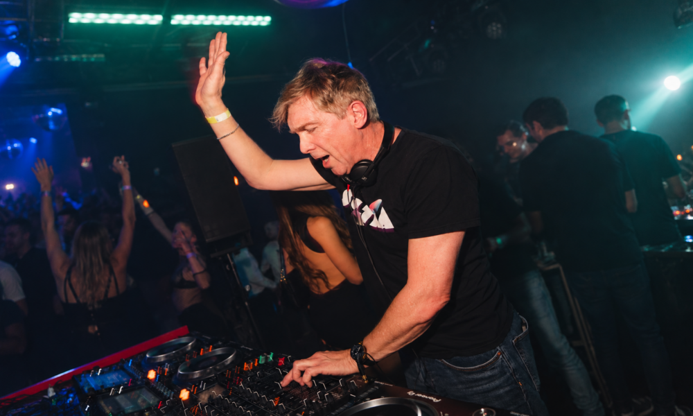 Michael Gray DJing during a live club performance for the 22nd anniversary of The Weekend