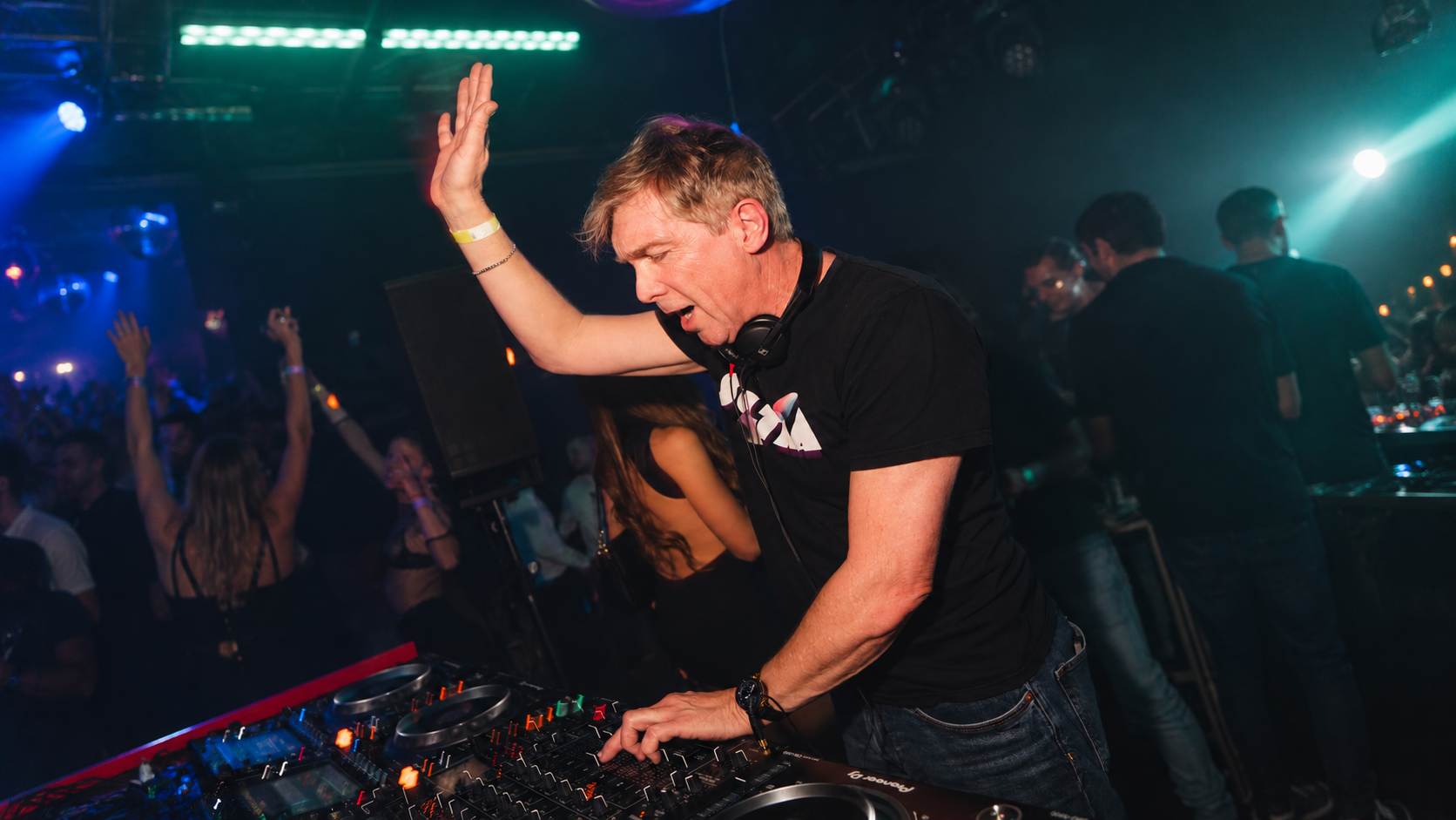 Michael Gray DJing during a live club performance for the 22nd anniversary of The Weekend
