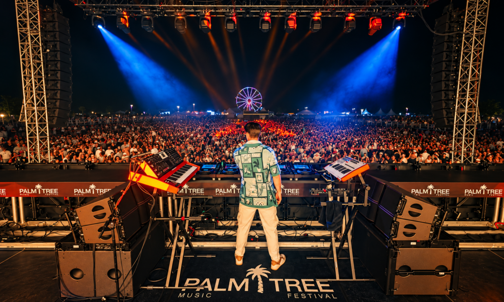 Palm Tree Music Festival stage overlooking a large audience at the West Palm Beach event
