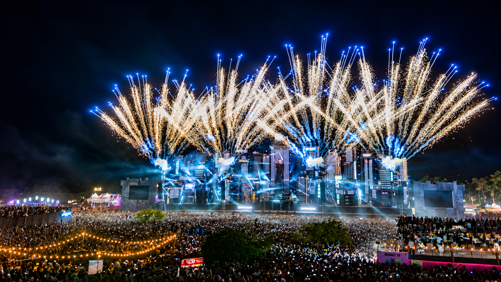Sunburn Festival main stage in Mumbai with fireworks above the crowd during a nighttime performance.