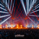 Together Festival stage at BITEC Bang Na with red lasers, white lights, flames and a large crowd